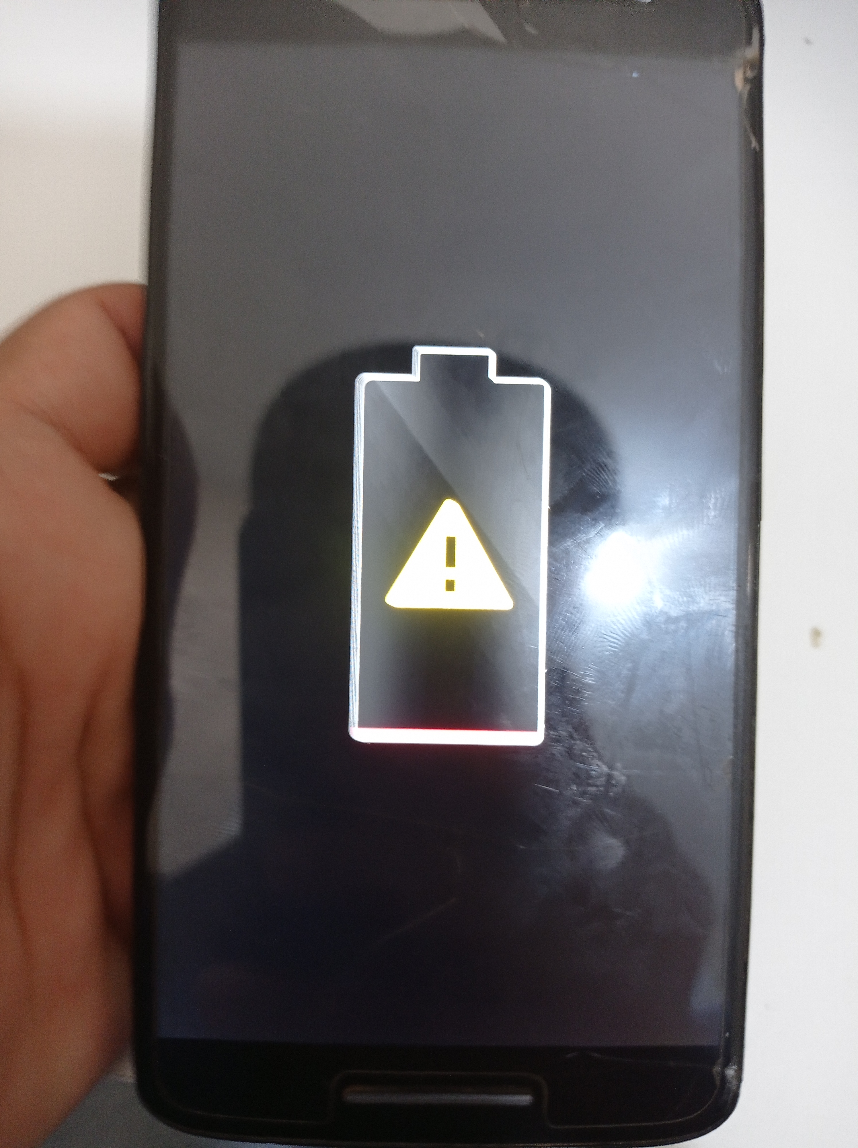 Moto X play não liga, aparece símbolo da bateria e desliga